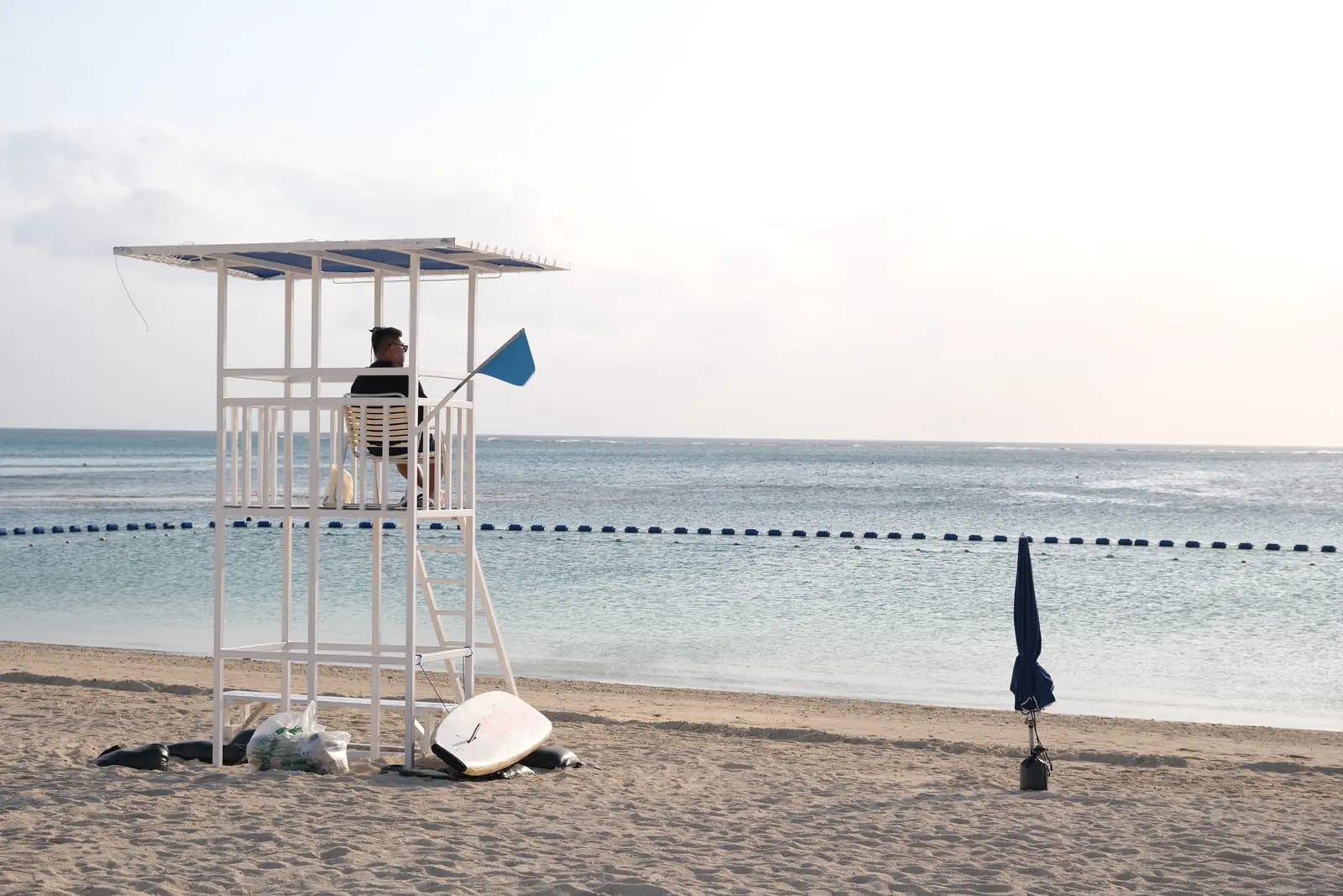 A lifeguard tower on a quiet Okinawa beach